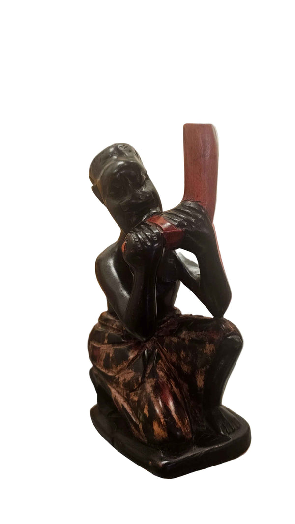 African Hand-Carved Horn Blower Figurine – Cultural Wood Art